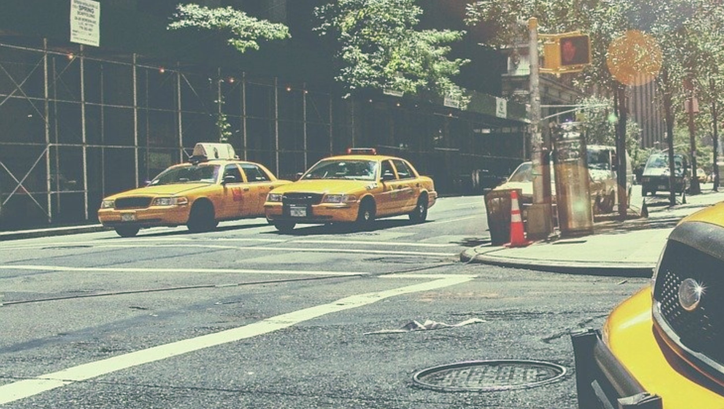Yellow taxi cab on the street