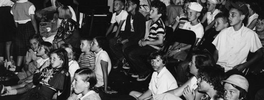Children seated in a City of Winnipeg Community Centre for a recreation program event, circa 1965