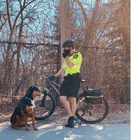 Man cycling with his dog