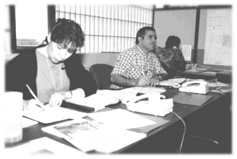 A picture of staff at the Flood Hotline, City of Winnipeg Photo