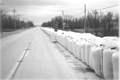 Sandbags line a roadside, City of Winnipeg Photo.