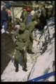 Scotia Street - military personnel at dike, City of Winnipeg Photo.