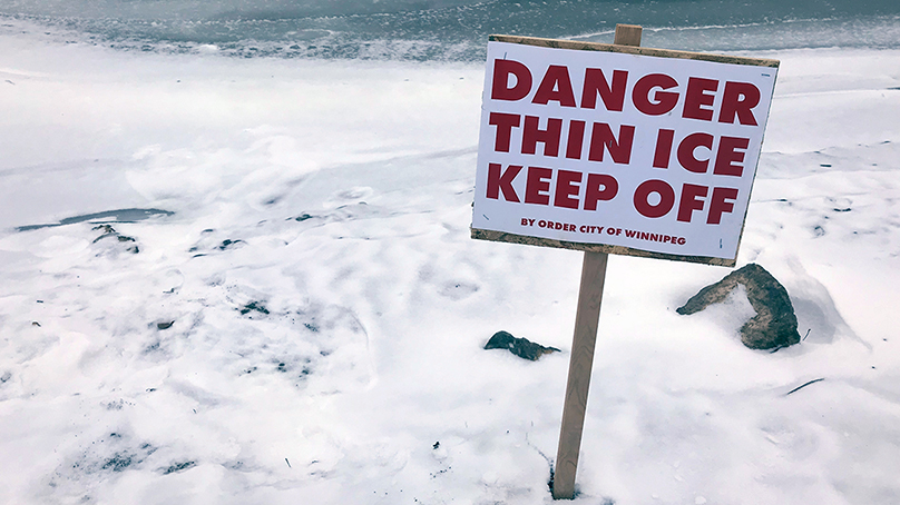 Sign: Danger thin ice keep off By order city of Winippeg