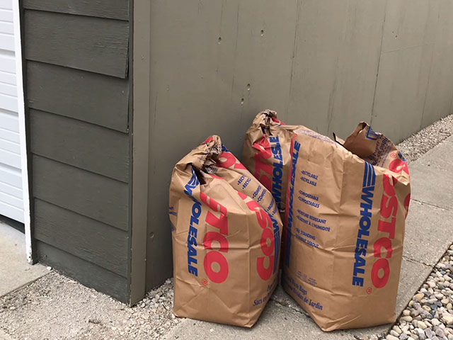 Residents should not store their yard waste next to any buildings or fences.