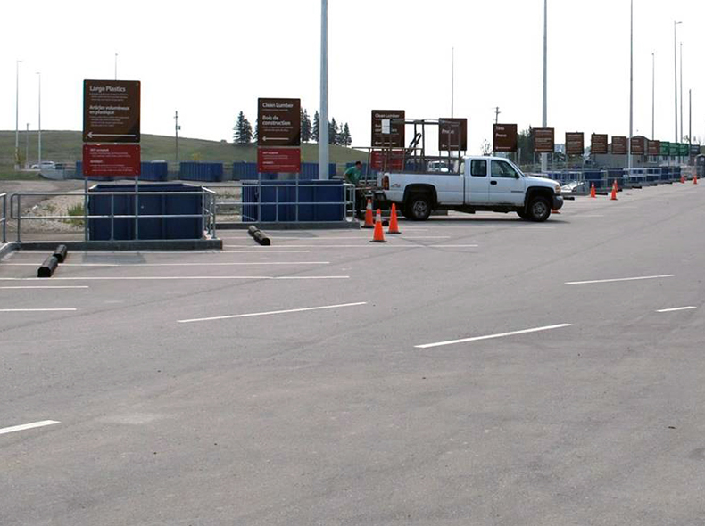 Truck backed up to bin at a 4R Depot