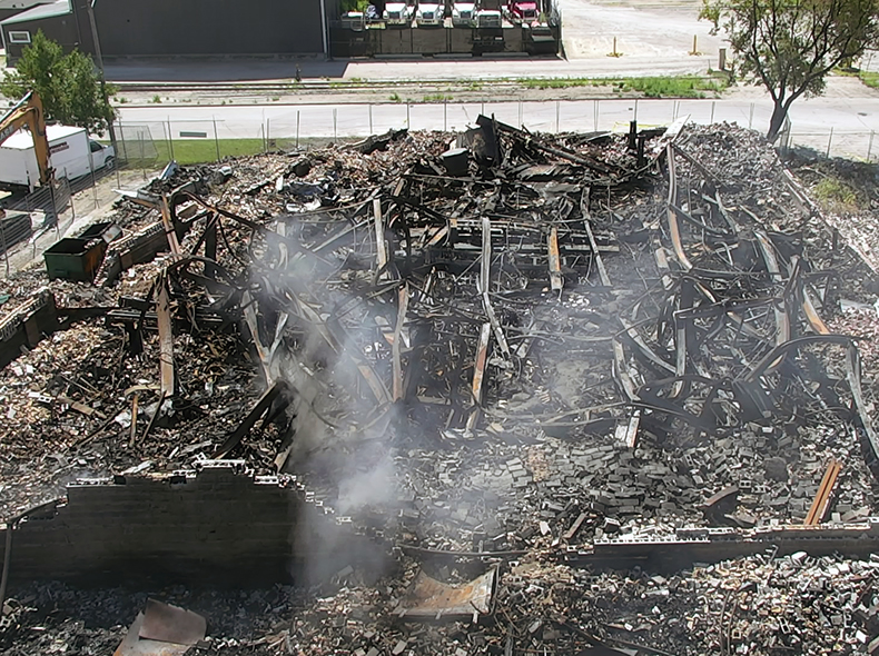 arial view of a burnt down apartment building