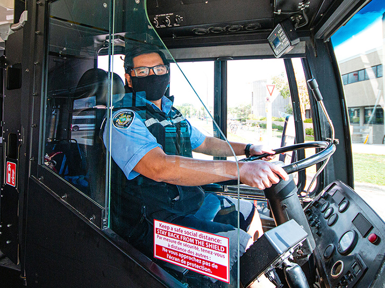 Bus driver with face mask