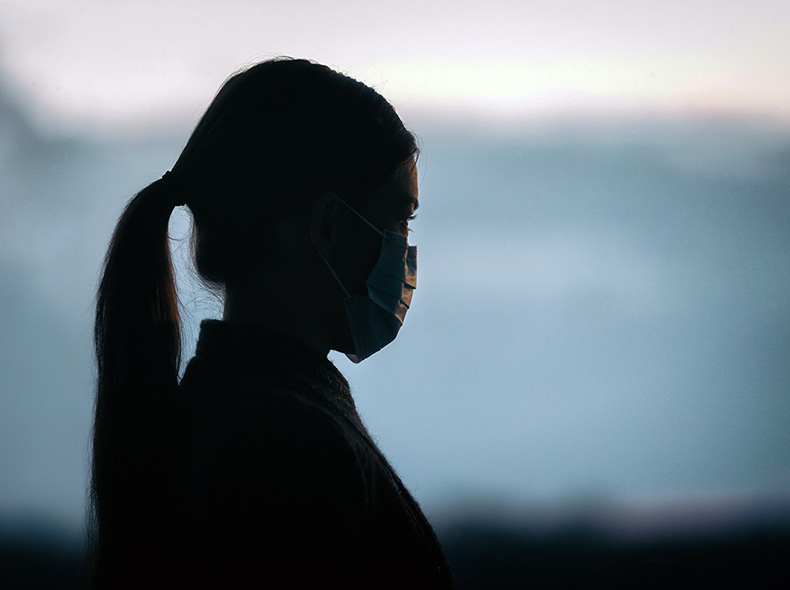 woman wearing mask