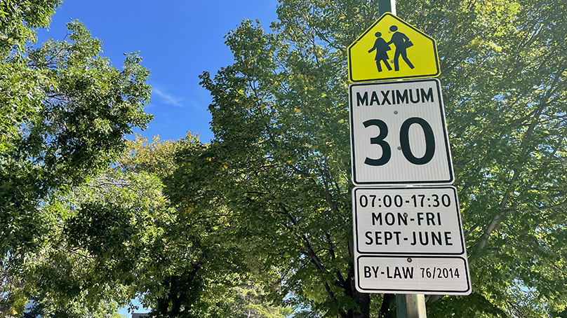 School zone and reduced speed limit sign