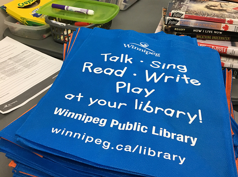 Winnipeg Public Library's Outreach Services Team prepared reading kits.