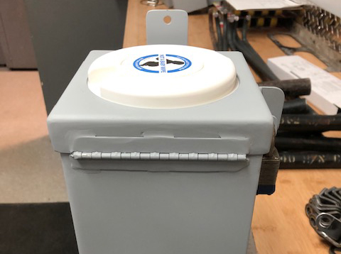 A lock box for disposable wipes custom designed by Winnipeg’s Fleet Management Agency