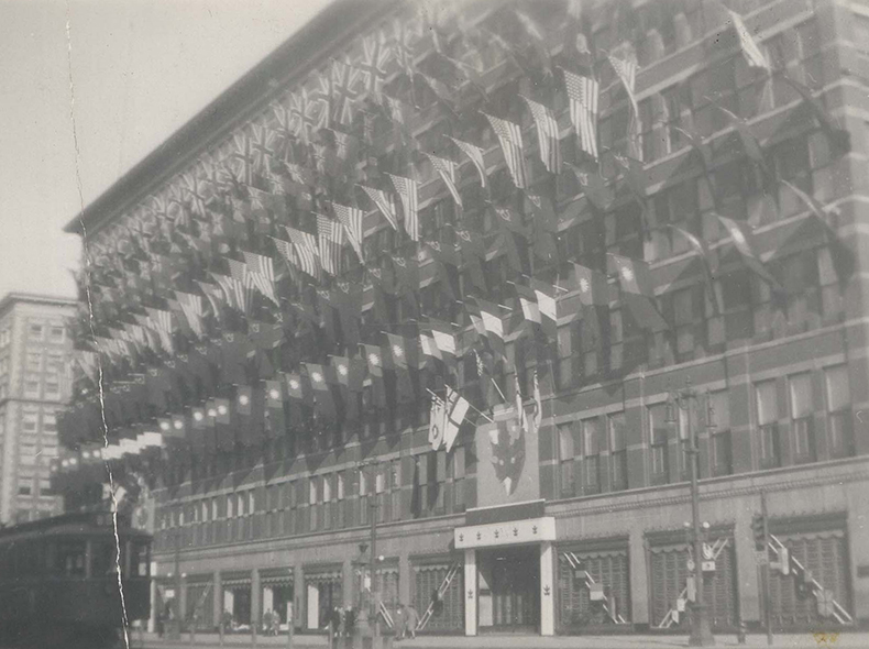 The former Eaton’s building on Portage Avenue decorated with flags to celebrate VE Day.