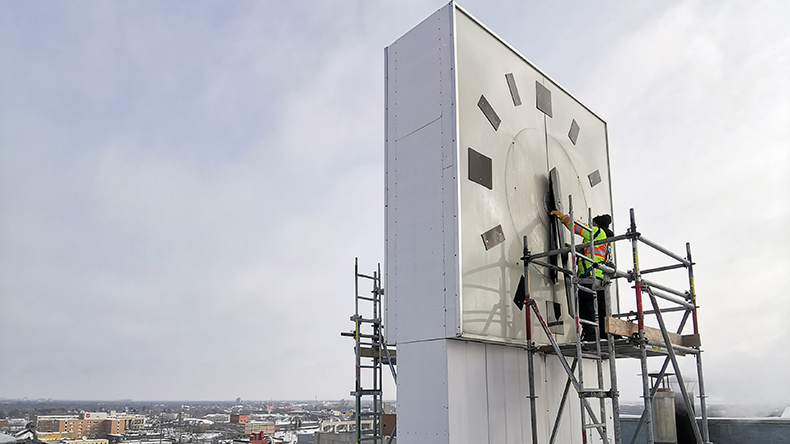 City crews repair the clock in 2020.