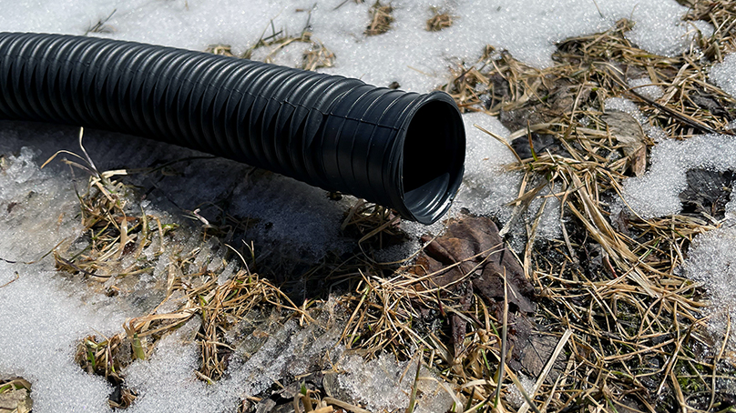 Your sump pump hose should be directed towards your yard.