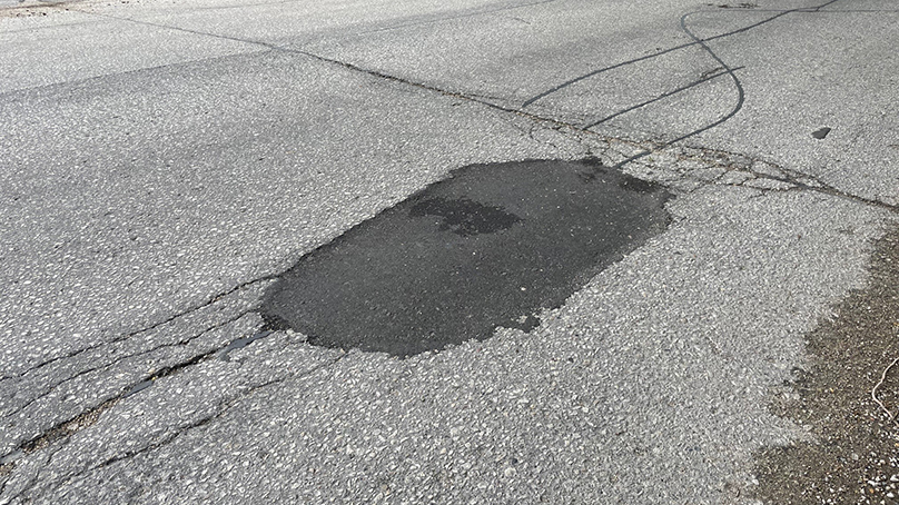 A pothole after being filled this spring.