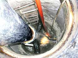 View down sewer as cleaning progresses