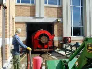 Motor being removed from main building